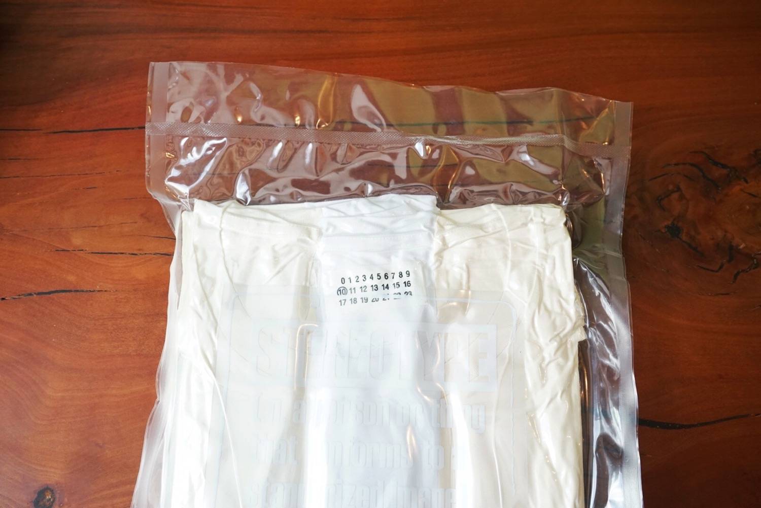 【即納&大特価】 新品 黒 L マルジェラ パックT Tシャツ Tシャツ/カットソー(半袖/袖なし)
